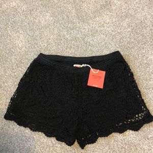 Black cotton lace shorts